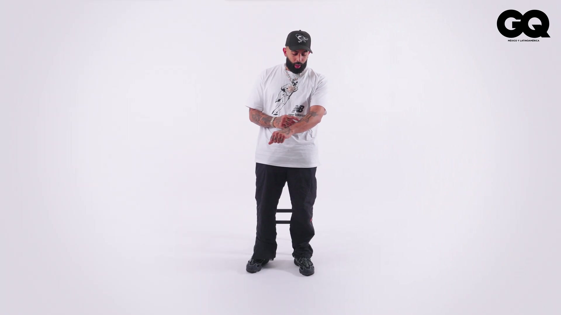 Eladio Carrión tattoos: Full-body view of both tattooed forearms