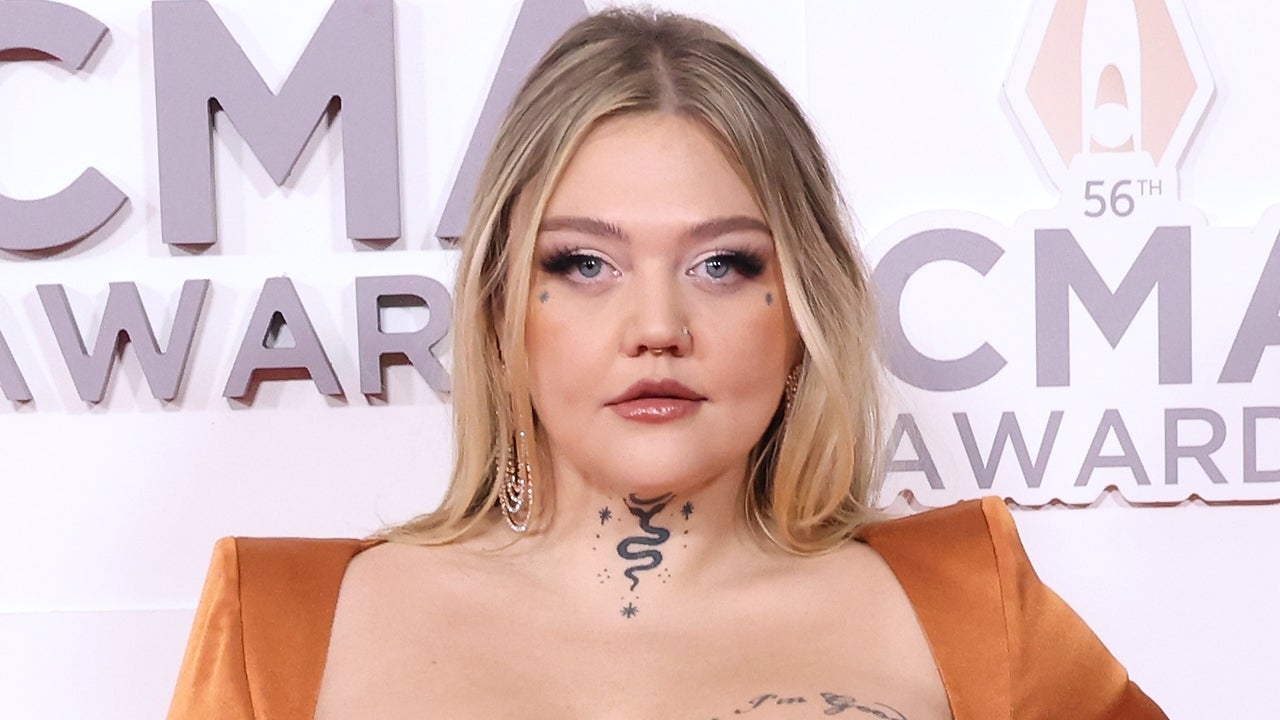 Elle King tattoos: Wide red-carpet portrait clearly showing the snake and stars on Elle King's neck