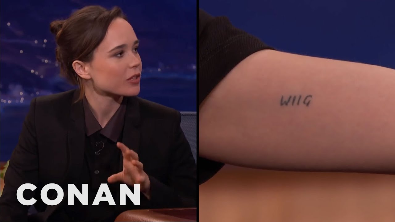 Elliot Page tattoos: Video still showing the WIIG tattoo in close-up