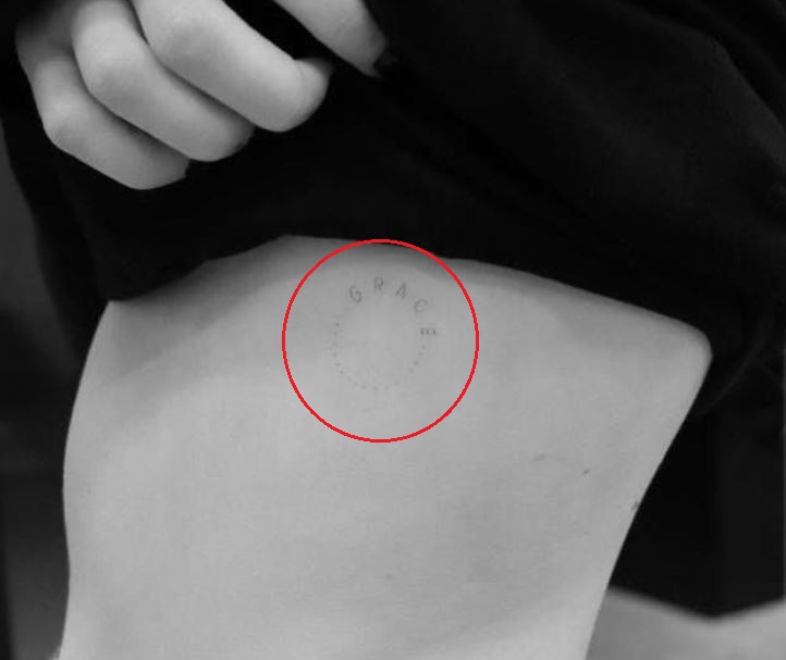 Emma Roberts genuine tattoo photograph showing the curved GRACE lettering and dotted outline Emma Roberts tattoos: genuine tattoo photograph showing the curved GRACE lettering and dotted outline