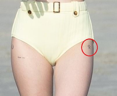 Emma Roberts genuine tattoo photograph showing the small hollow star on the left thigh Emma Roberts tattoos: genuine tattoo photograph showing the small hollow star on the left thigh