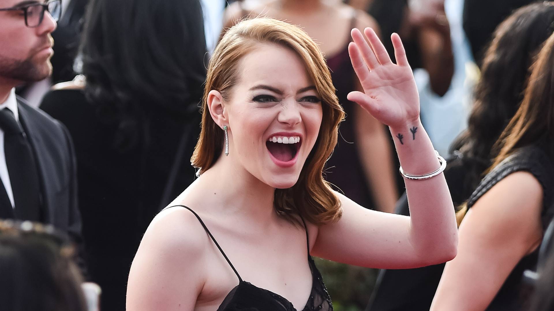 Emma Stone tattoos: Genuine tattoo evidence for the documented Blackbird family tattoo.