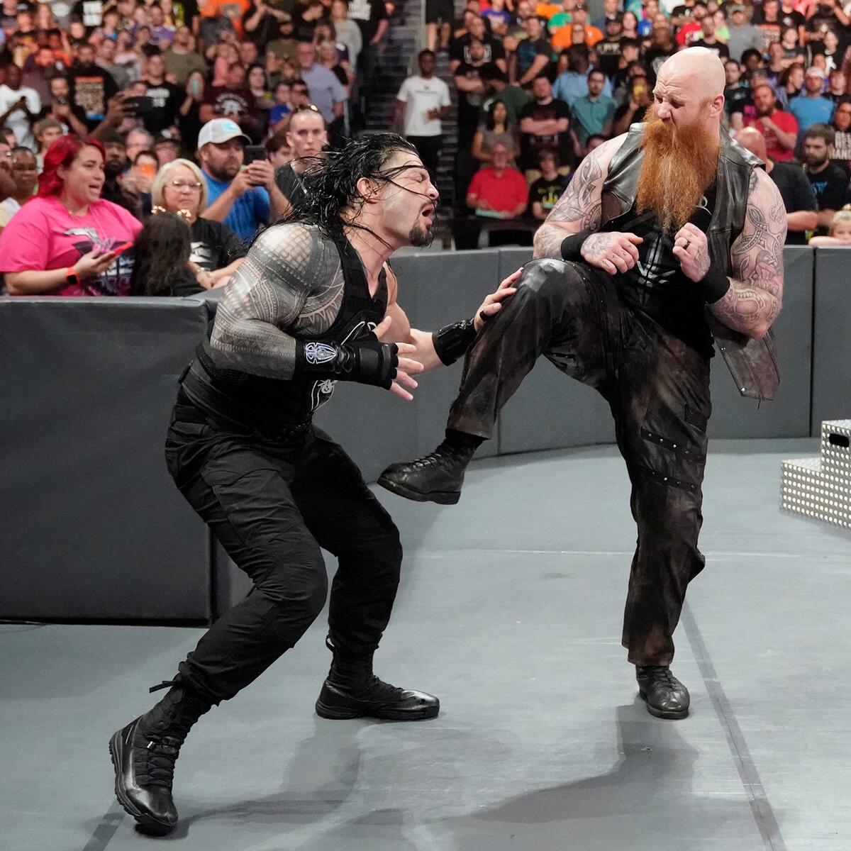 Erick Rowan tattoos: Left forearm framed warrior face and adjoining sleeve ornament