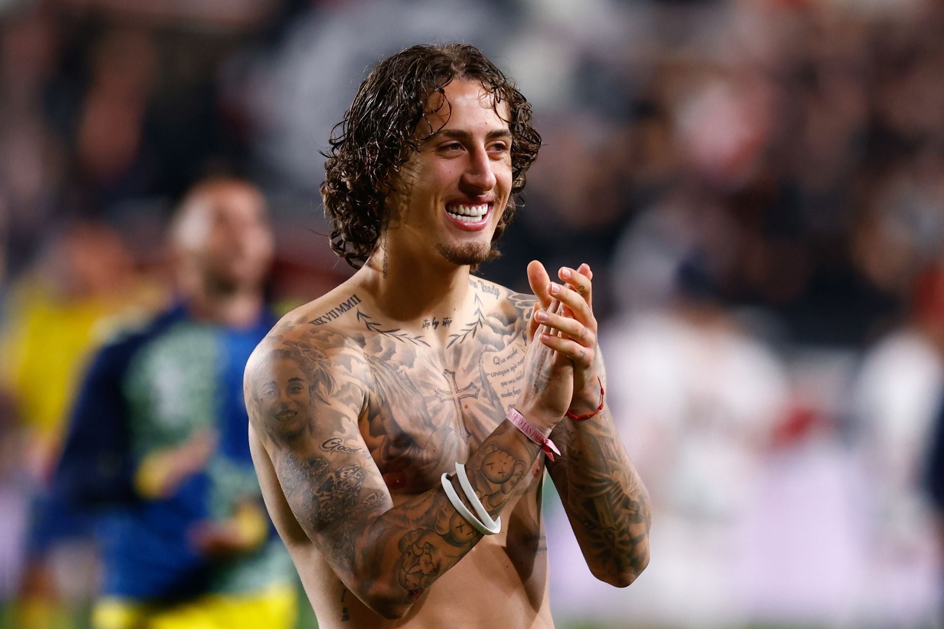 Fabio Silva chest and forearm tattoos in a genuine tattoo photograph