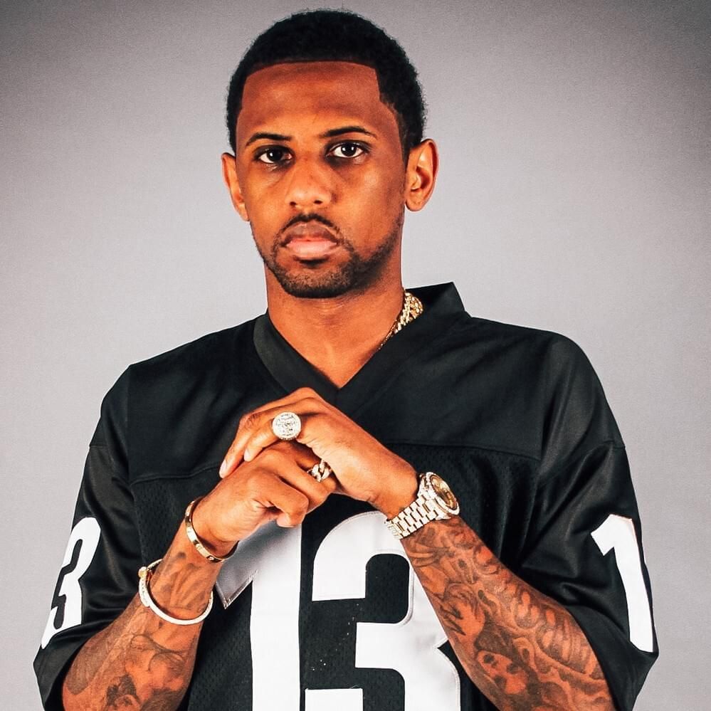 Fabolous tattoos: front-facing portrait with visible tattoos across both arms