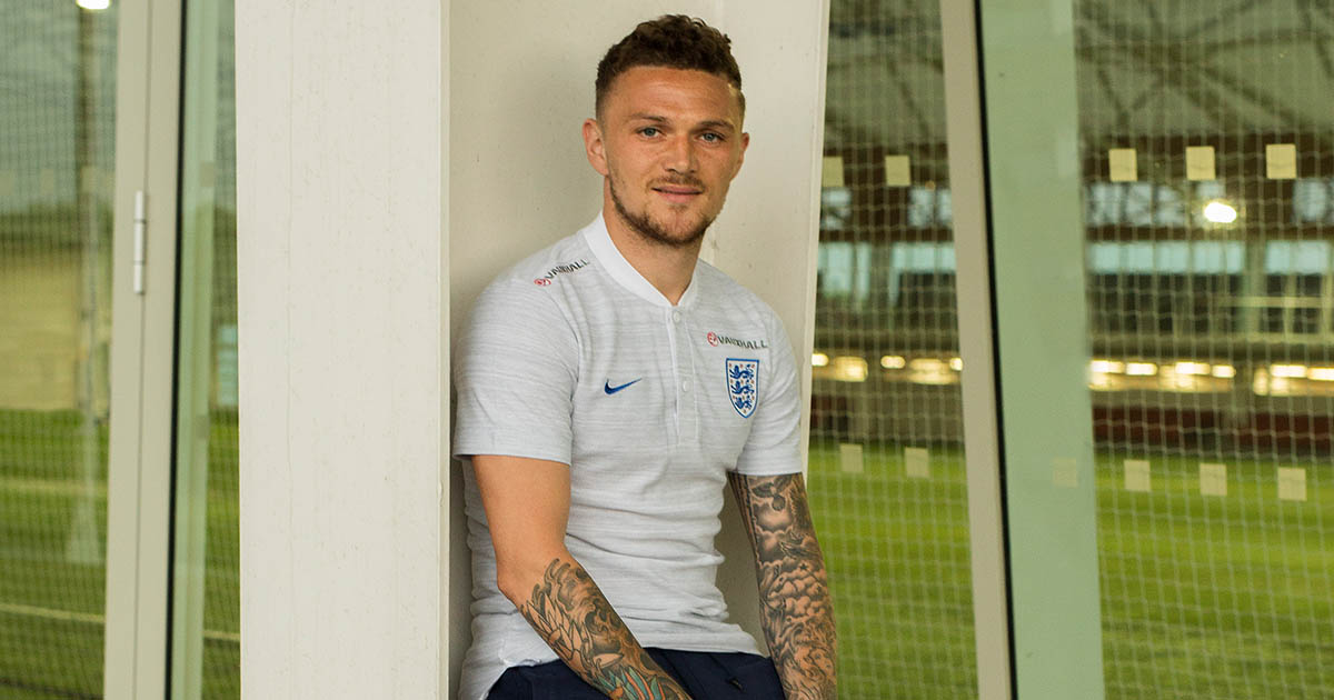 Kieran Trippier tattoos: Kieran Trippier seated training portrait with both forearms and sleeve tattoos visible