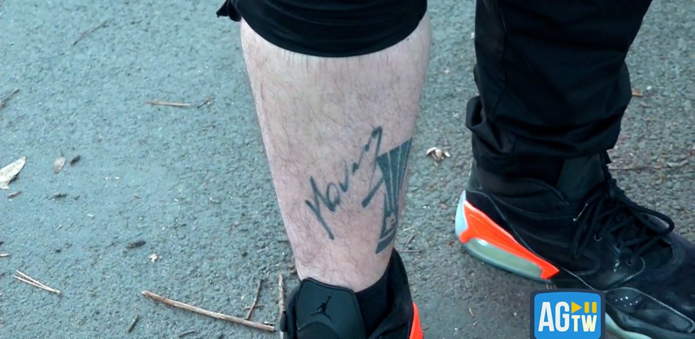 Flavio Cobolli AmoR calf tattoo evidence Flavio Cobolli tattoos: AmoR calf tattoo evidence