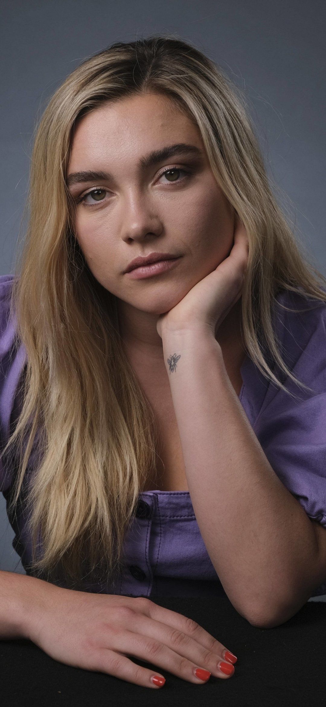 Florence Pugh tattoos: documented worker bee tattoo evidence, inner wrist view