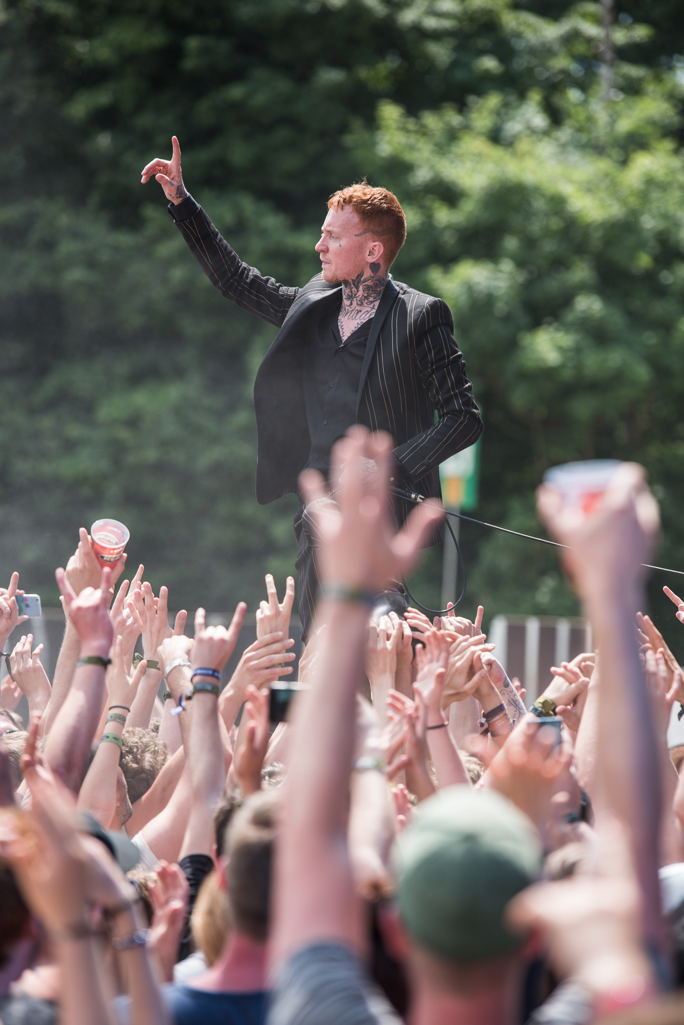 Frank Carter chest lettering and neck tattoos