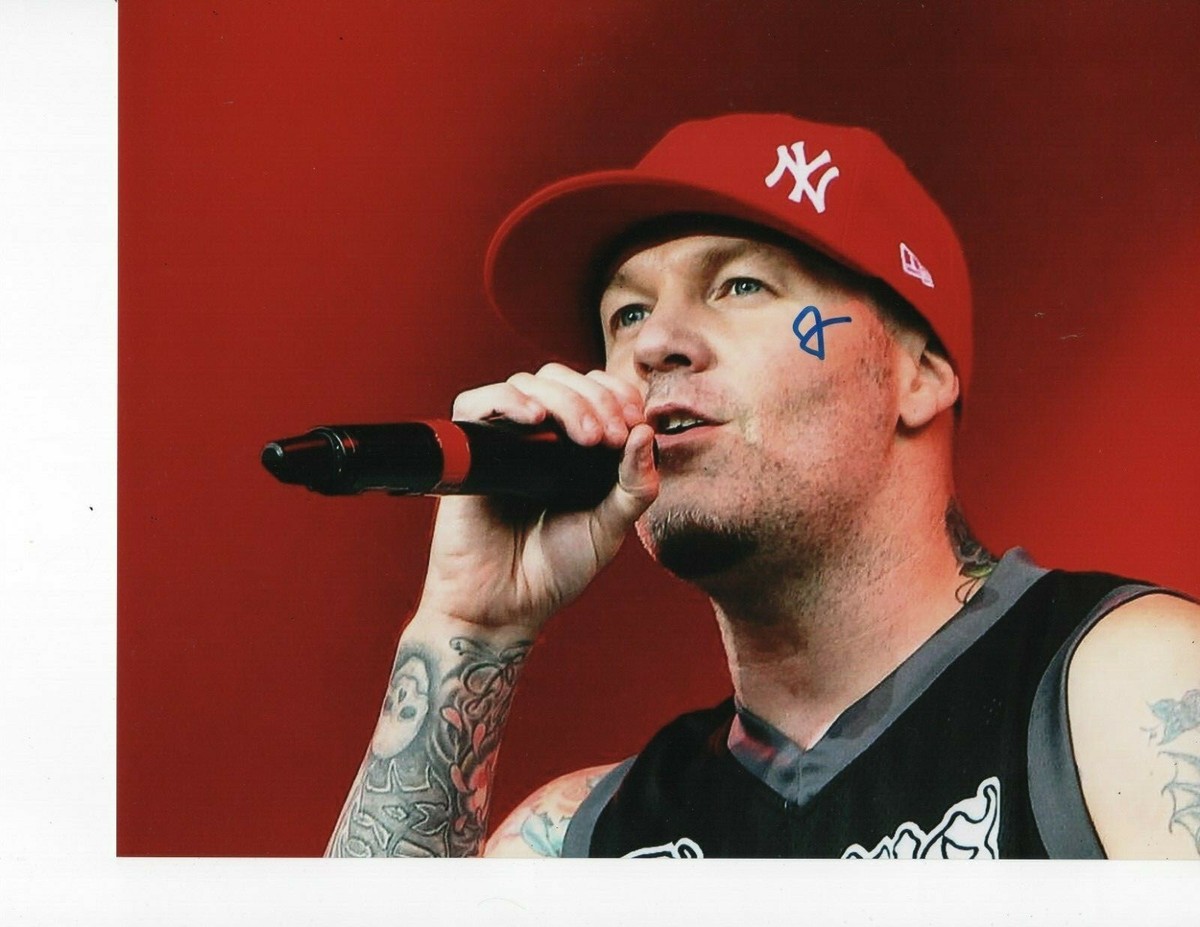 Fred Durst forearm and chest tattoos