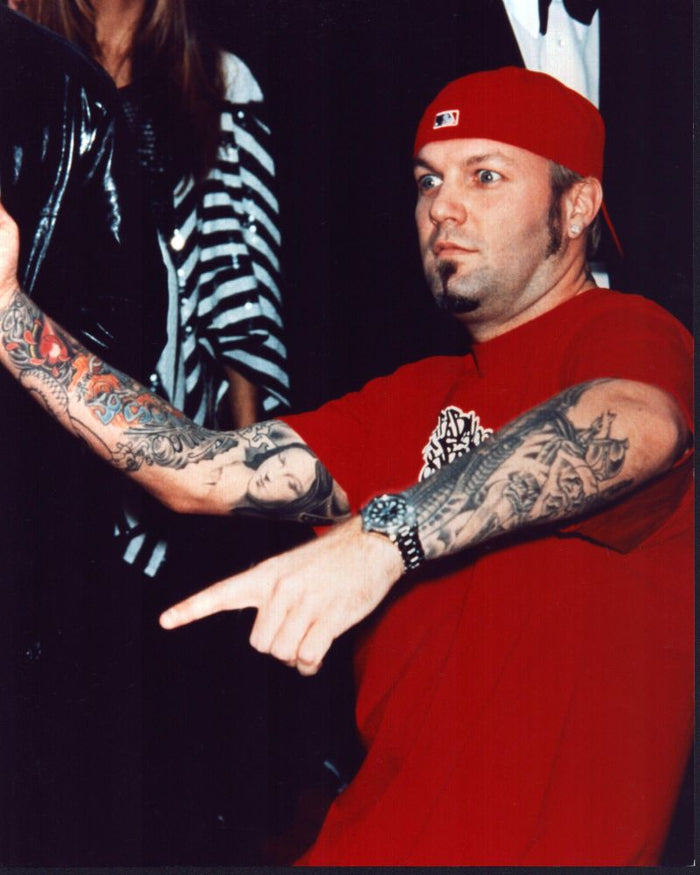 Fred Durst red hat tattooed portrait