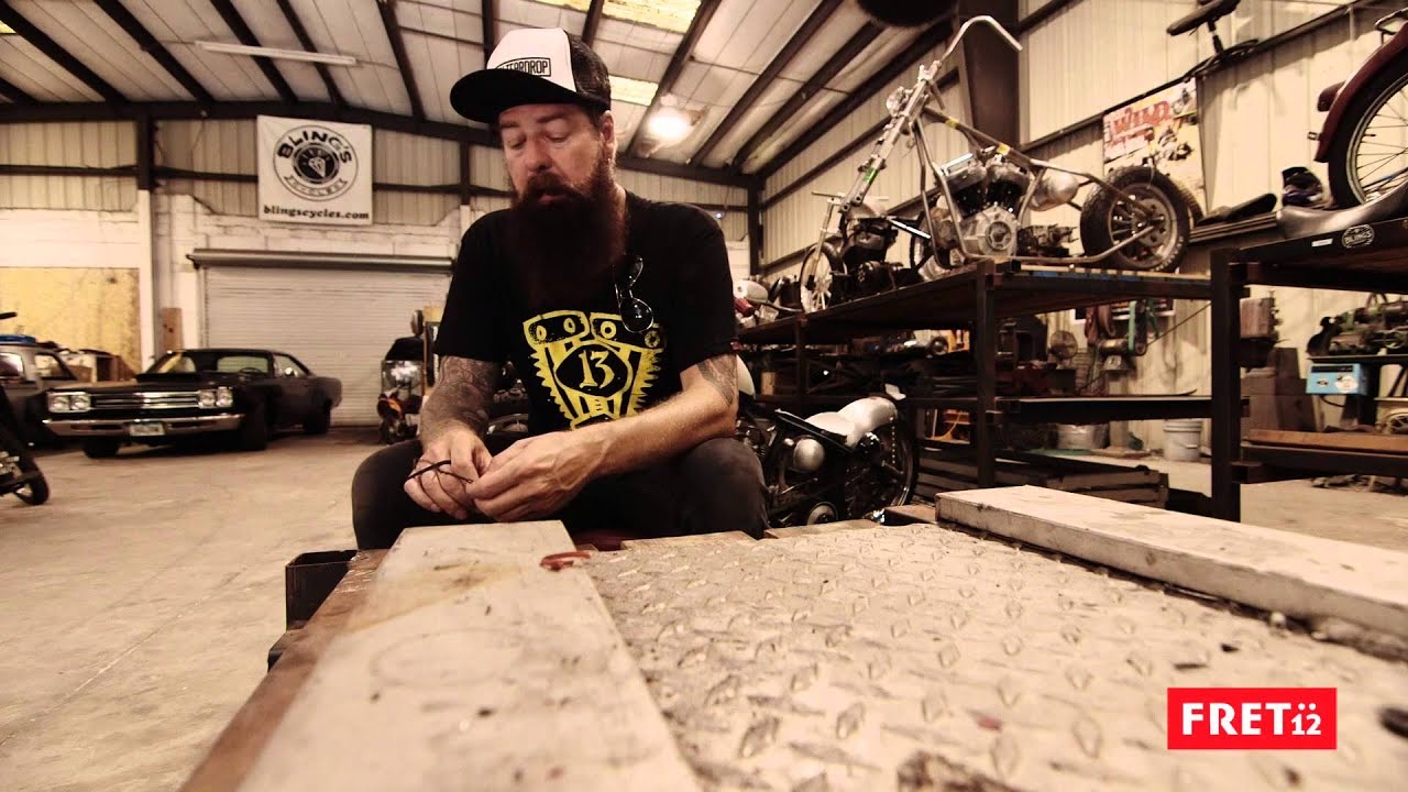 Jim Root tattooed forearms