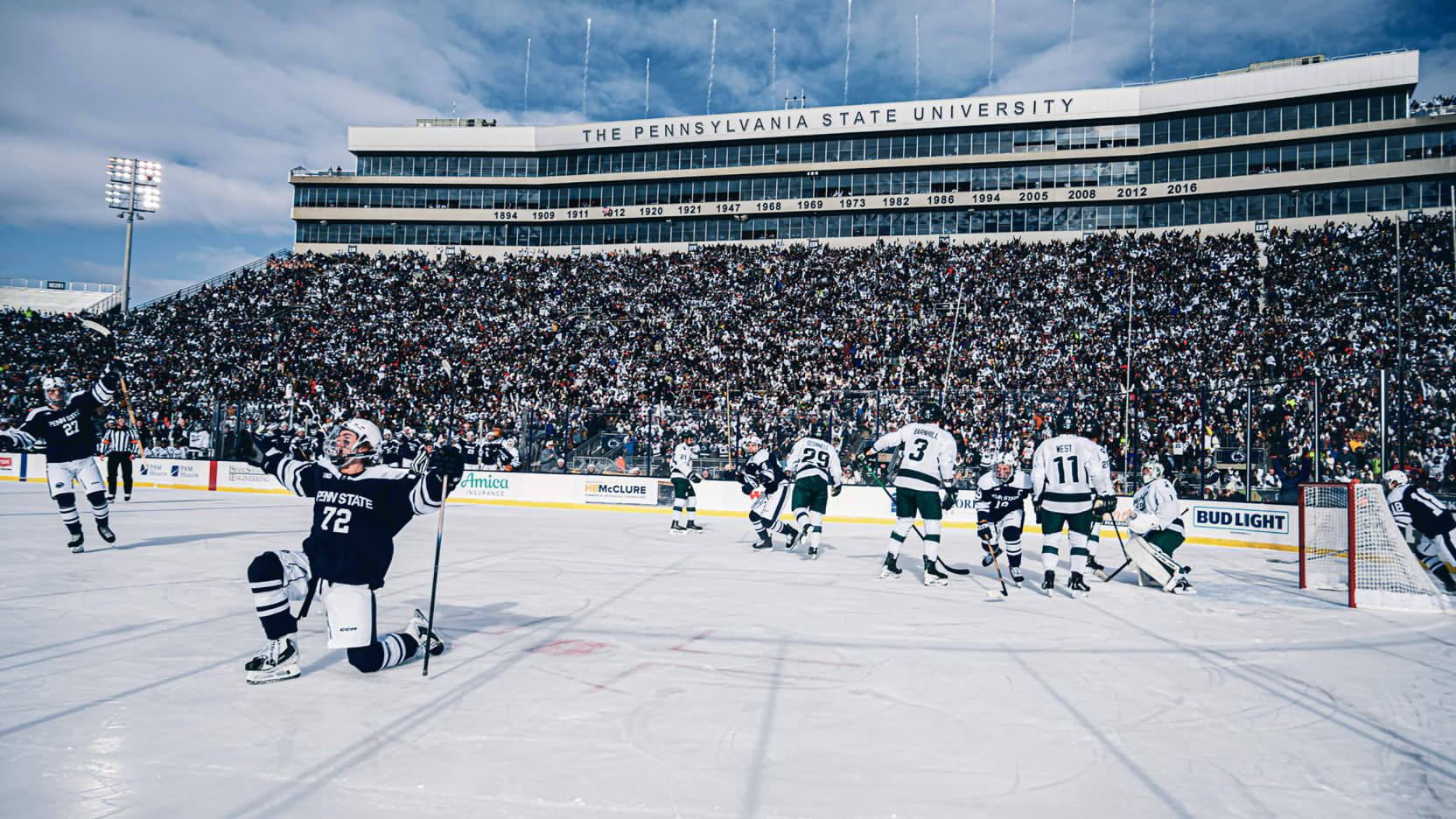 Gavin McKenna in a contextual photograph: Contextual Penn State stadium photograph; not tattoo evidence.; not tattoo evidence