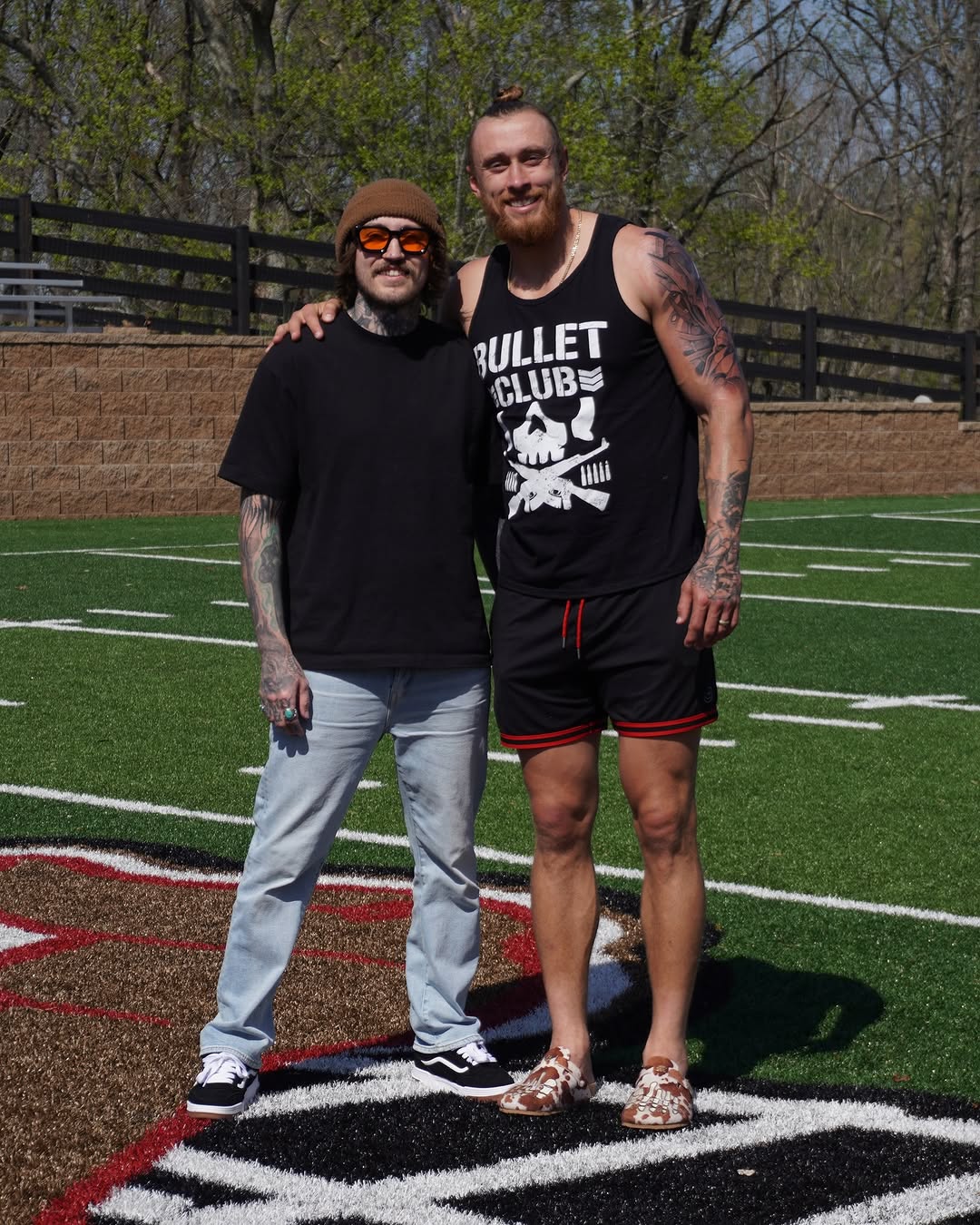 George Kittle tattoos: field photograph showing the arm and hand tattoo coverage