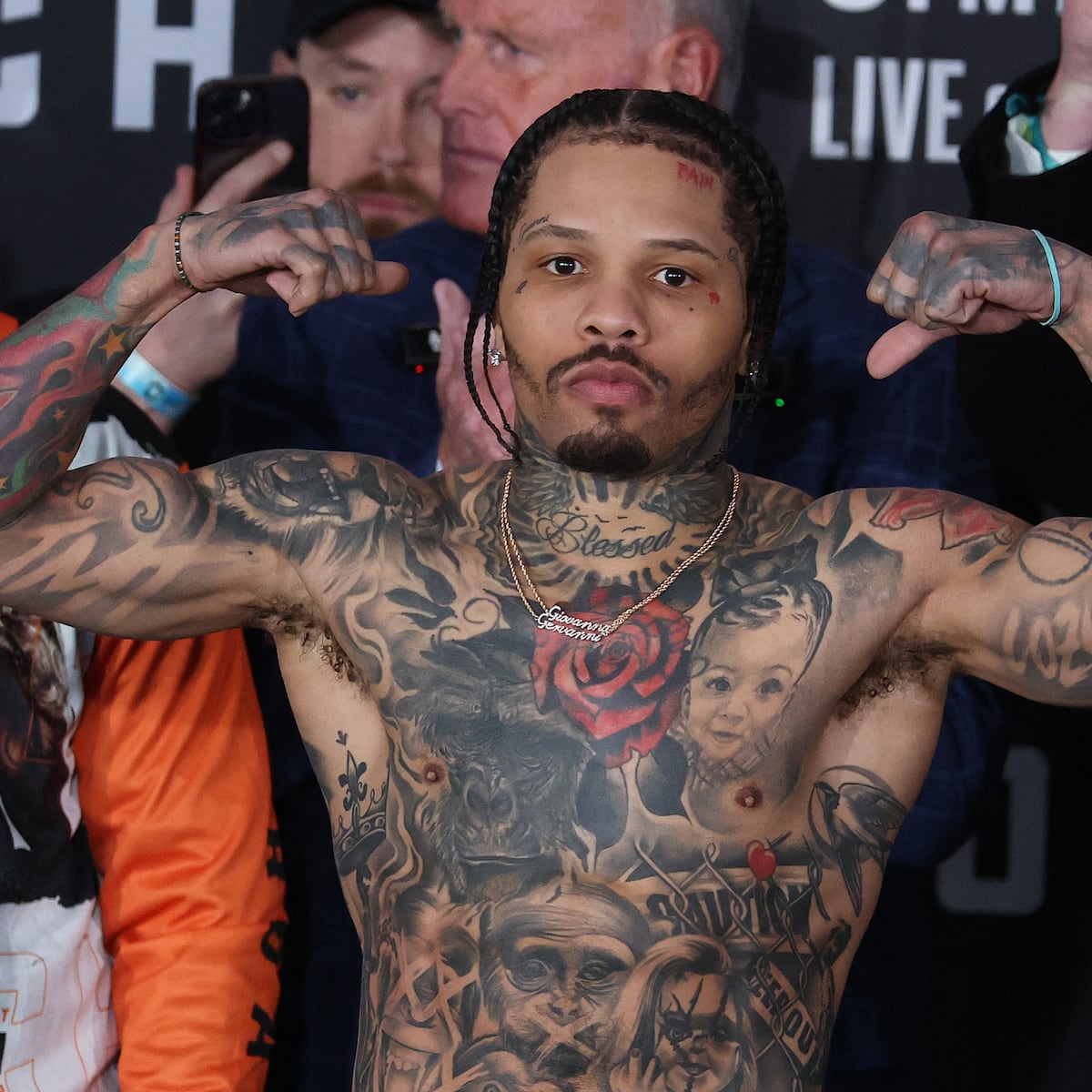 Gervonta Davis tattoos: Rose and family portraits