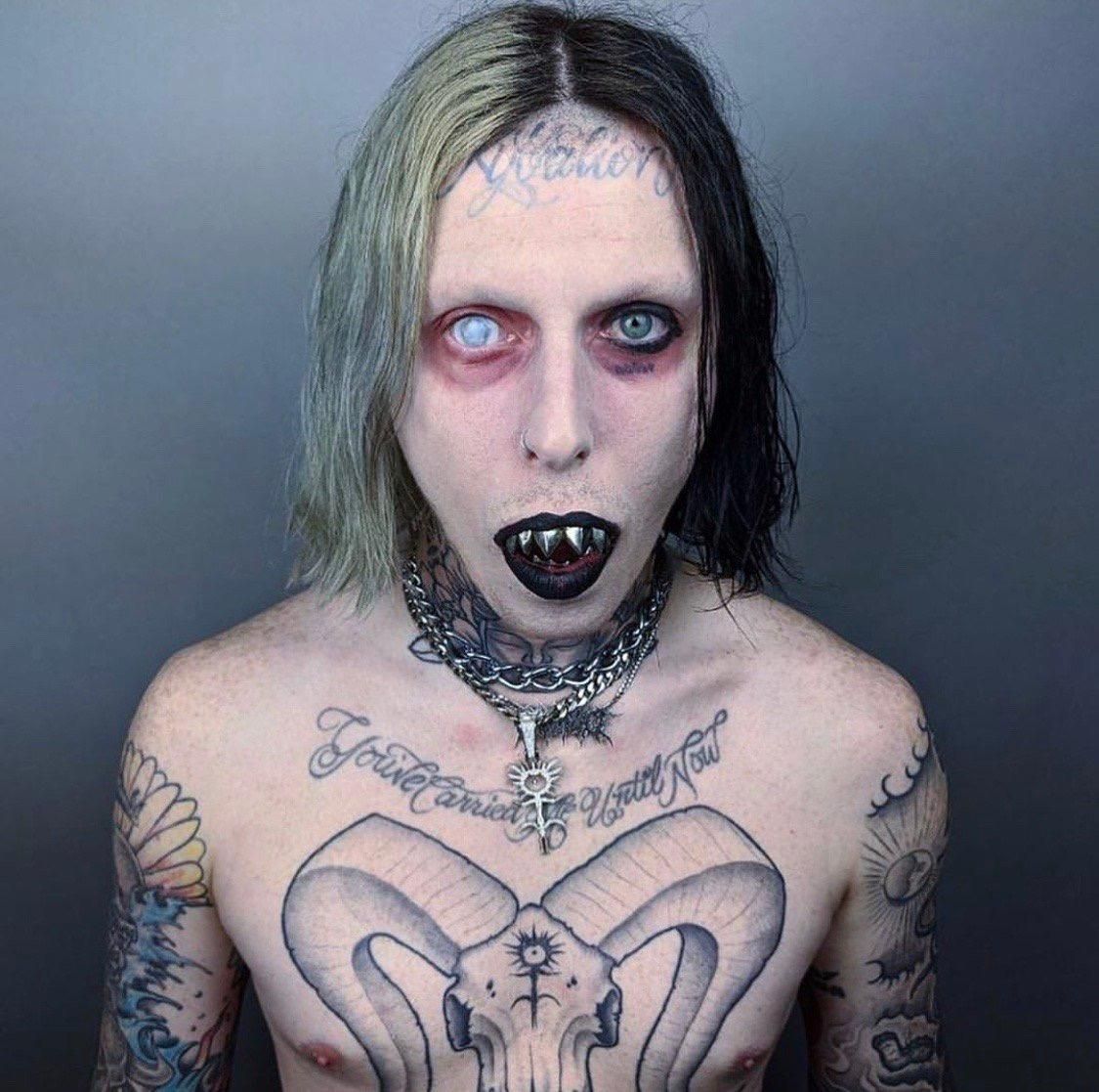 Ghostemane ram skull chest tattoo