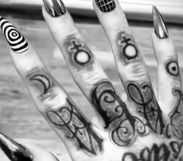 Ghostemane right hand and finger tattoos