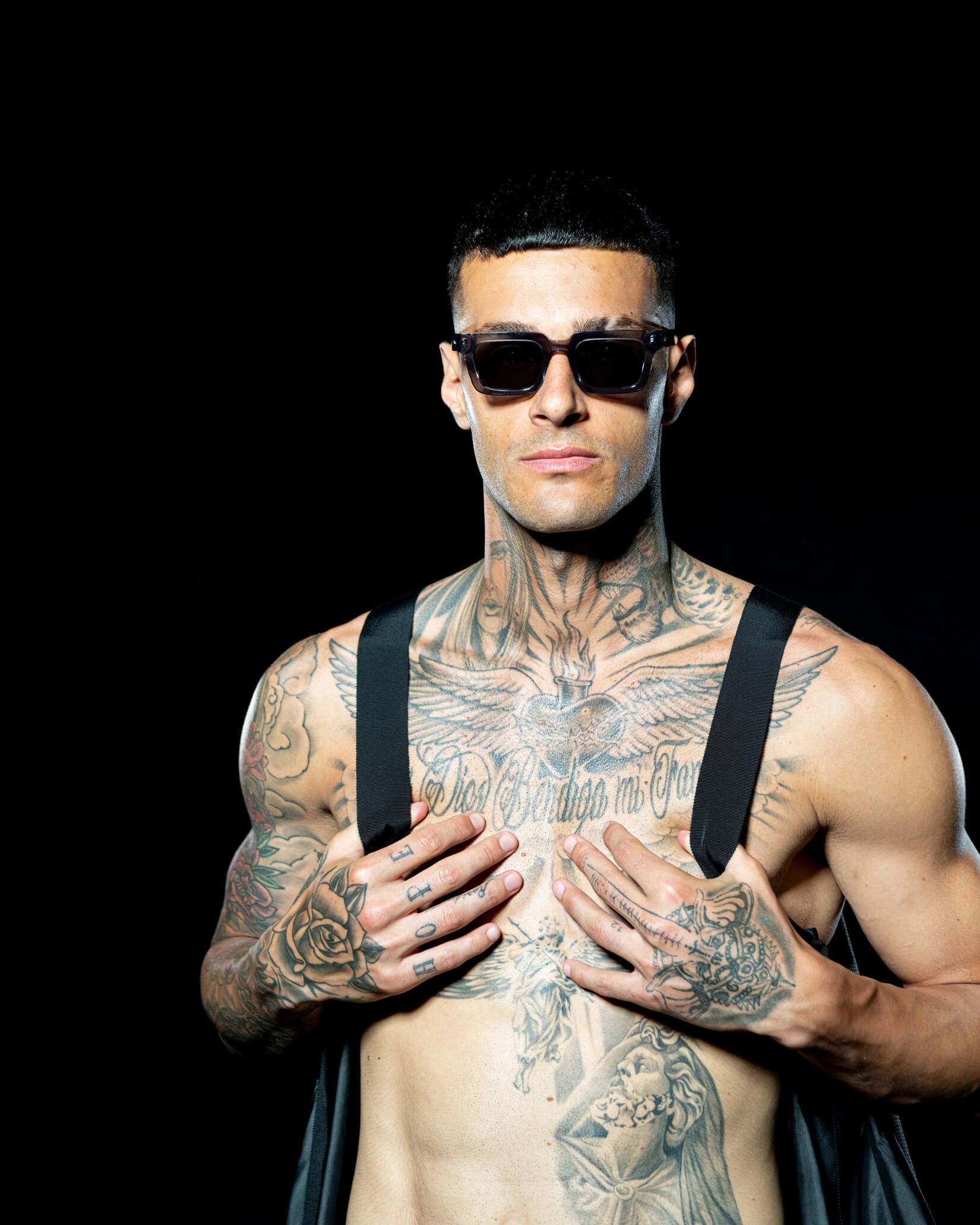 Gianluca Scamacca Chest lettering and ornamental upper-body work Gianluca Scamacca tattoos: Chest lettering and ornamental upper-body work