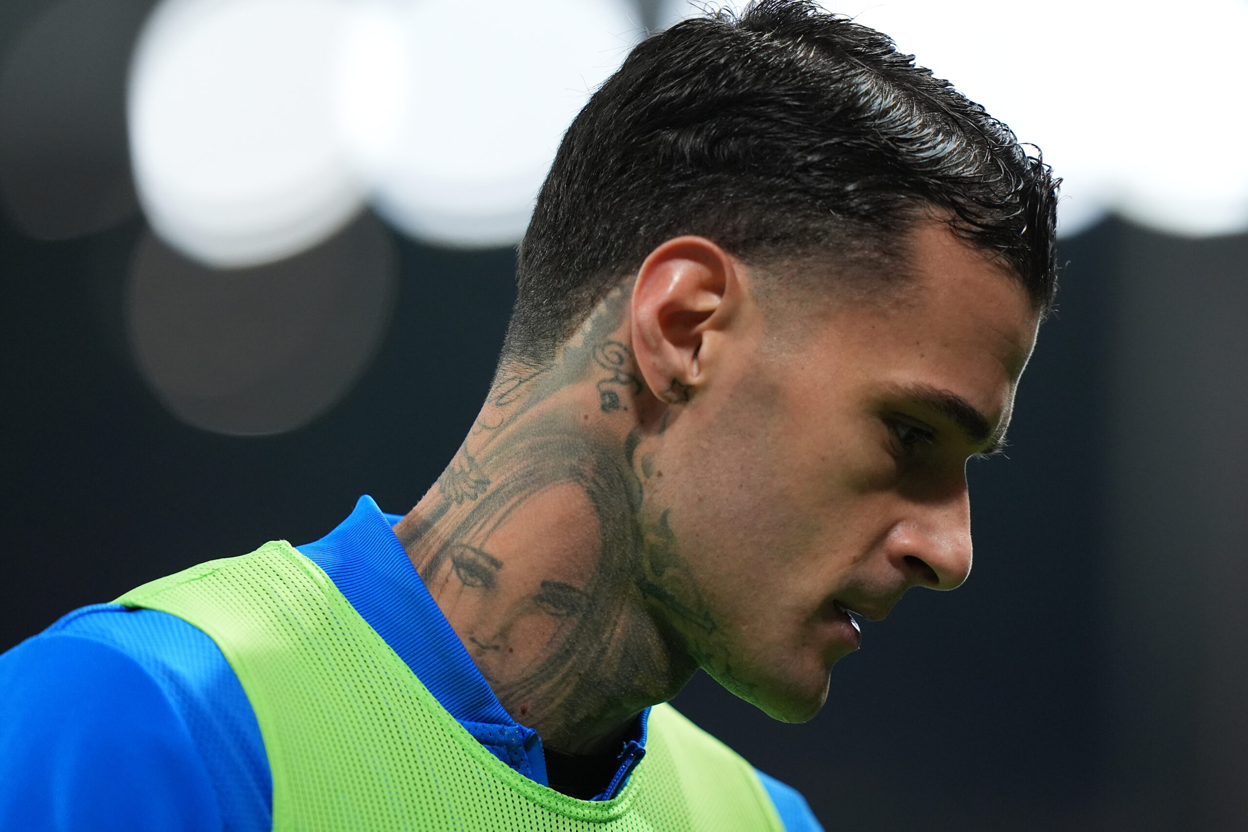 Gianluca Scamacca tattoos: Neck composition and behind-ear shading