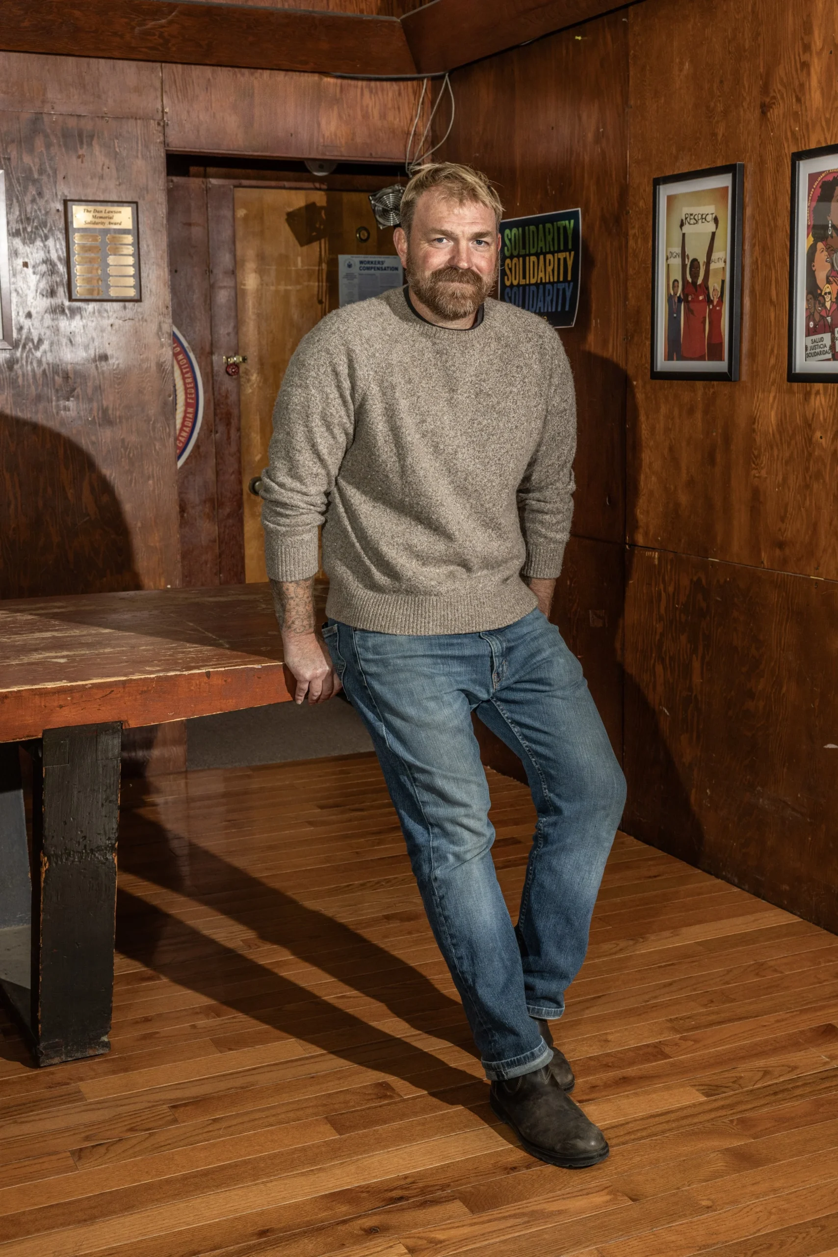 Graham Platner in a contextual photograph: Contextual editorial portrait, not tattoo evidence.; not tattoo evidence