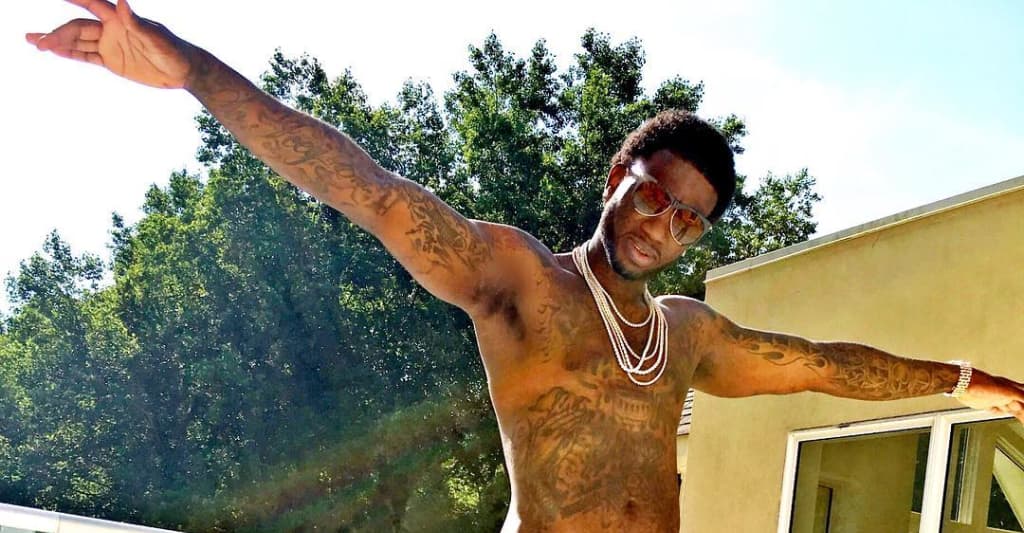 Gucci Mane arm tattoos