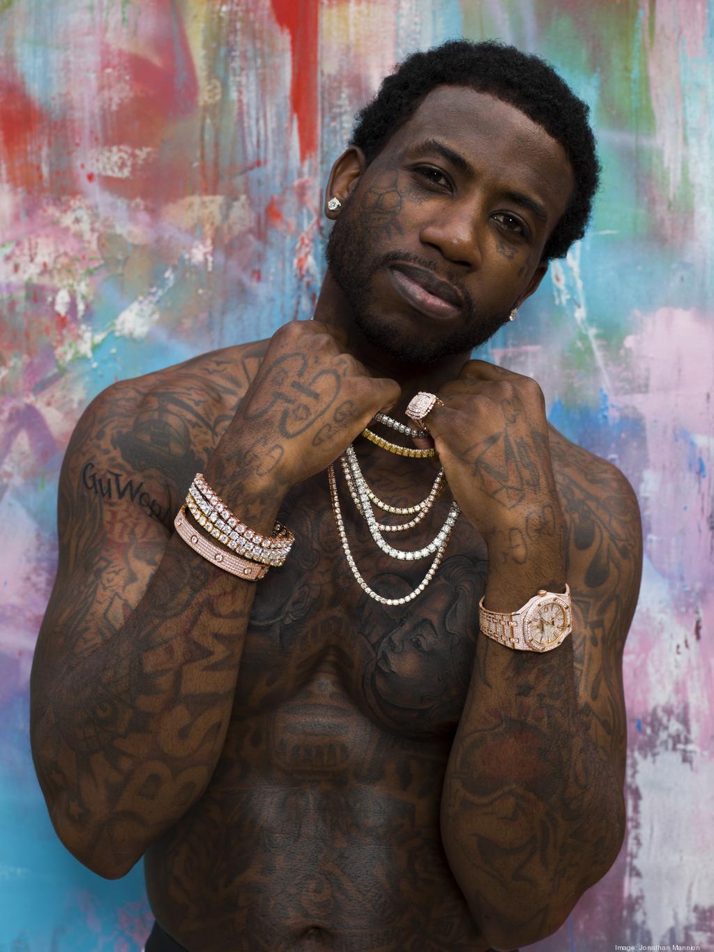 Gucci Mane face and neck tattoos