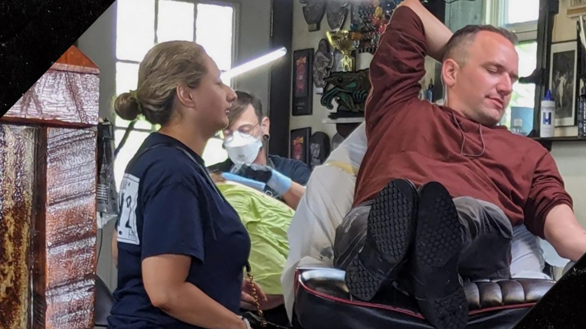 Gypsy Rose Blanchard in a contextual photograph: tattoo-session context; not tattoo evidence