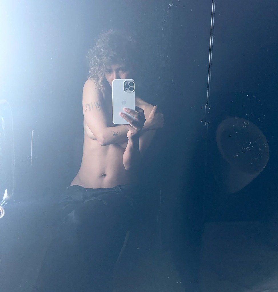 Halle Berry temporary arm tattoos in mirror selfie