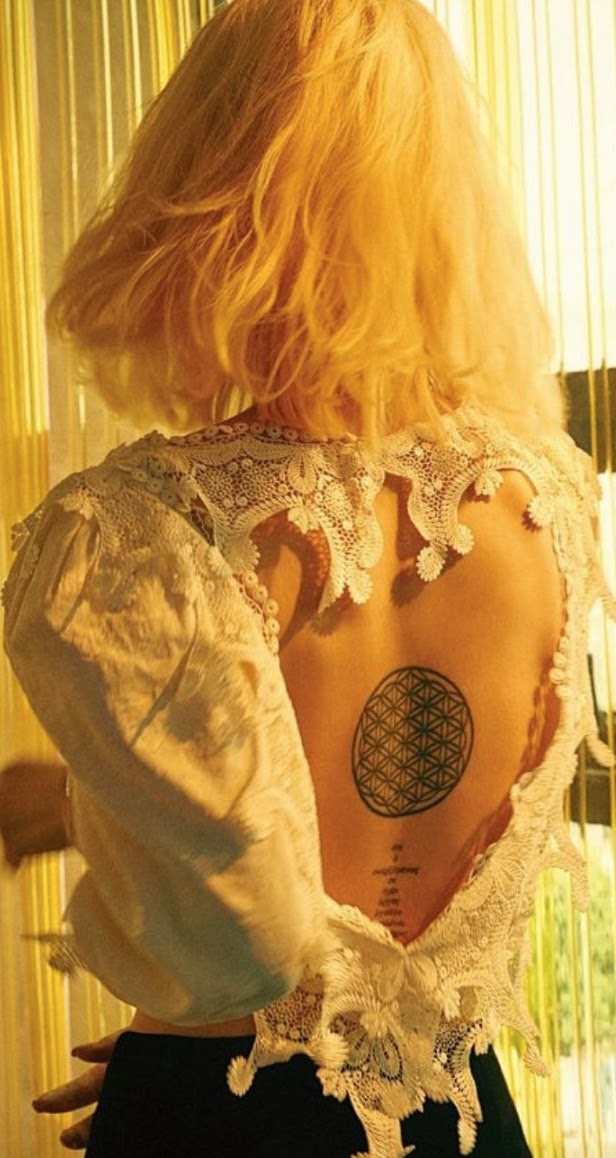 Han Ye Seul tattoos: The geometric Flower of Life on her back