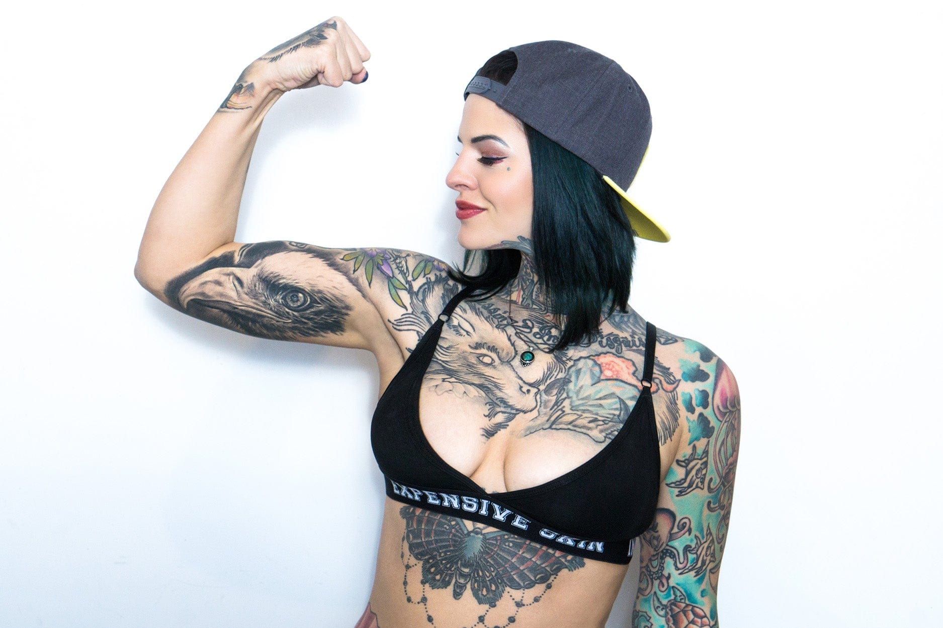 Black and grey eagle head on Heidi Lavon’s right upper arm Heidi Lavon tattoos: Black and grey eagle head on Heidi Lavon’s right upper arm
