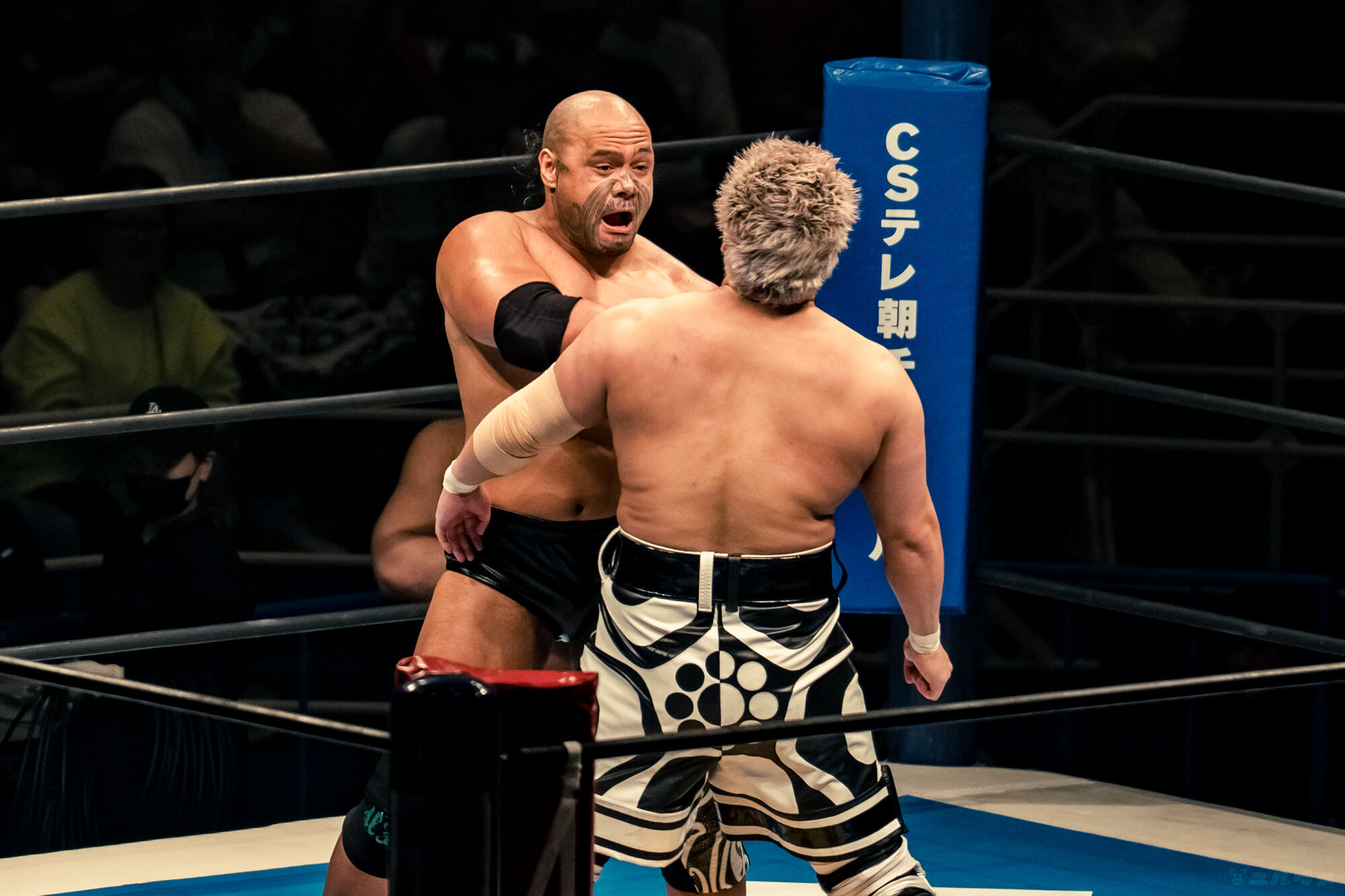 Henare in a June wrestling match Henare in a contextual photograph: How he reads in the ring; not tattoo evidence
