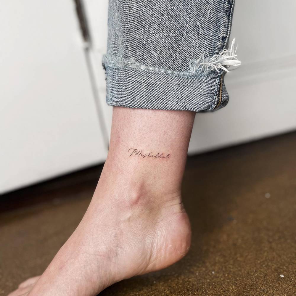 Hilary Duff tattoos: fine script family name tattoo on the wrist
