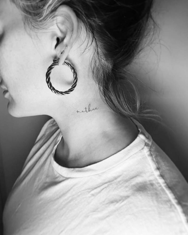 Hilary Duff tattoos: mother lettering near the neck with visible face and placement