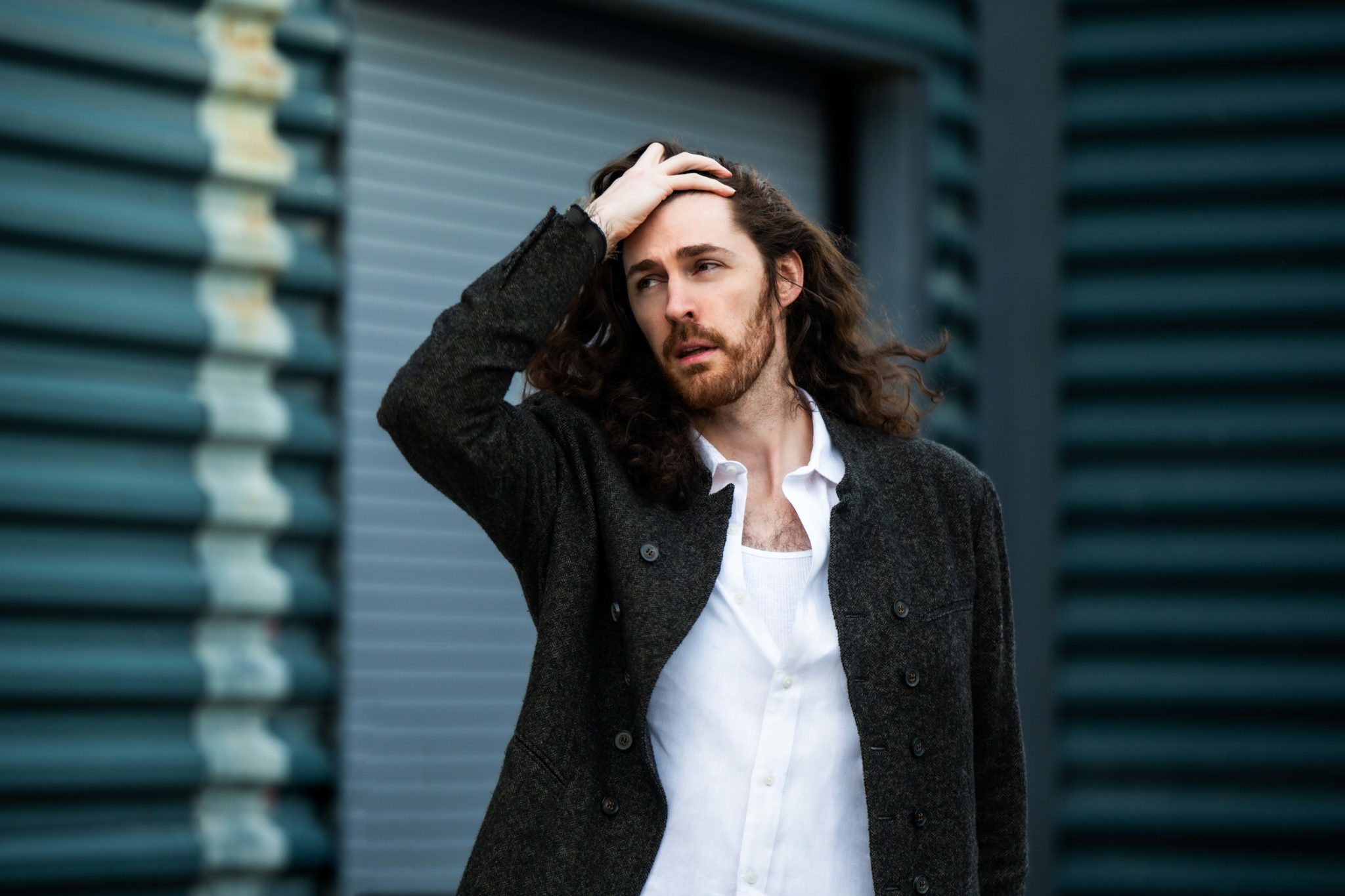 Hozier contextual portrait by Ruth Medjber Hozier tattoos: Contextual portrait of Hozier; this photograph does not show tattoo evidence