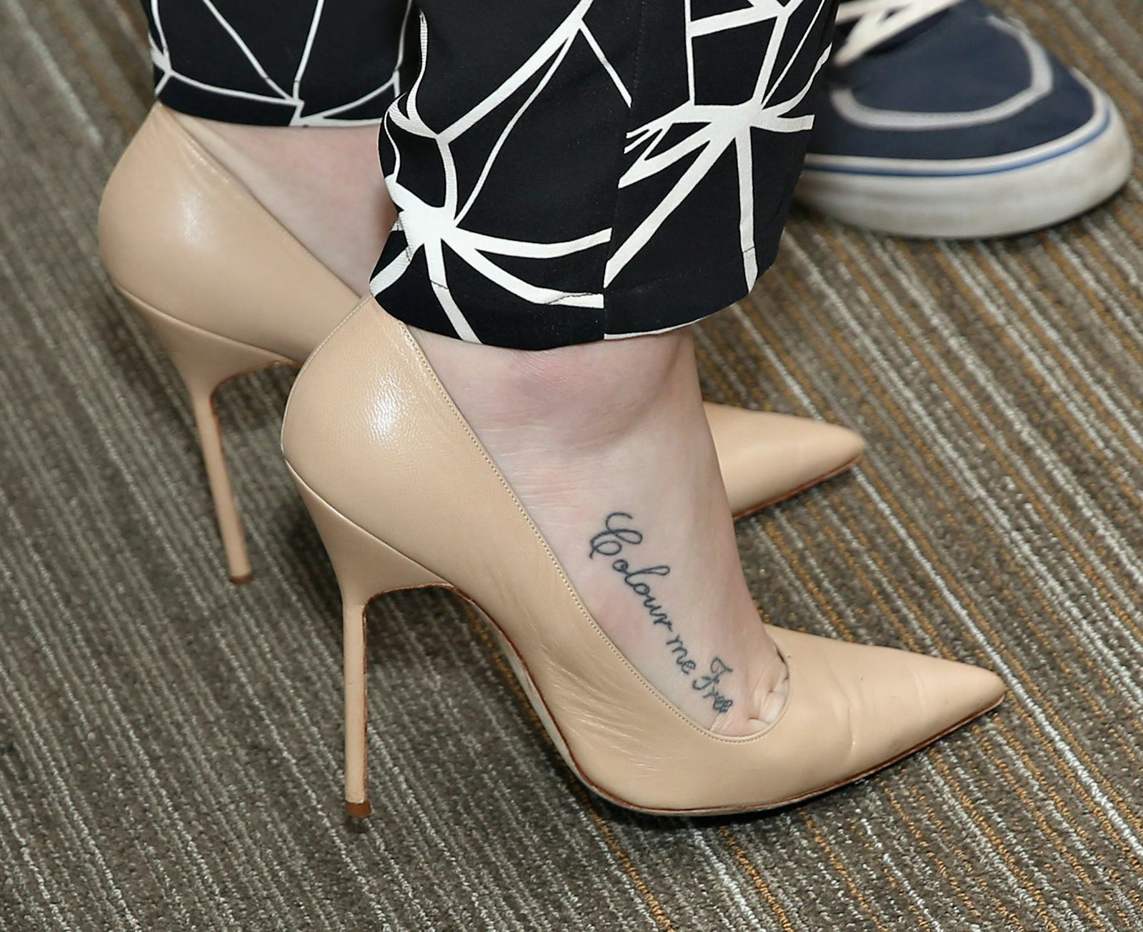 Iggy Azalea tattoos: Colour Me Free foot tattoo