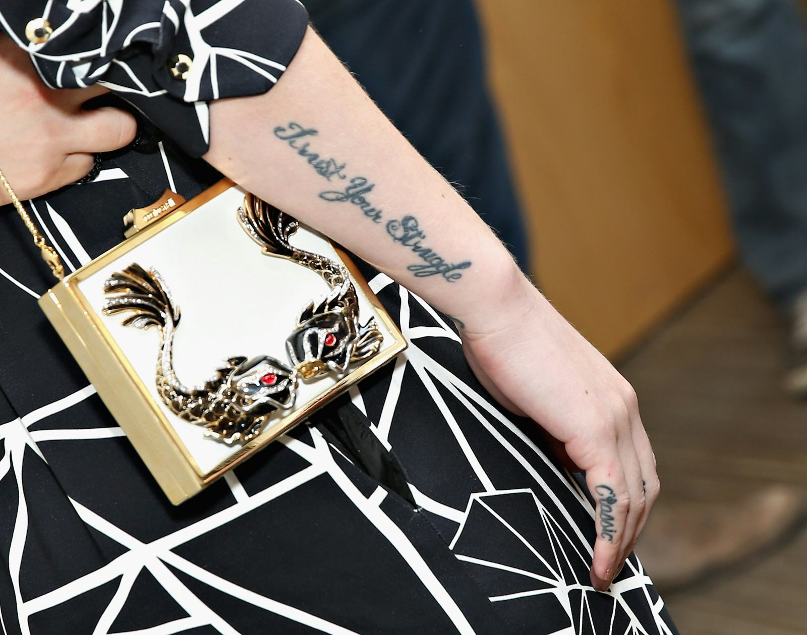 Iggy Azalea tattoos: Finger lettering and music-linked tattoos