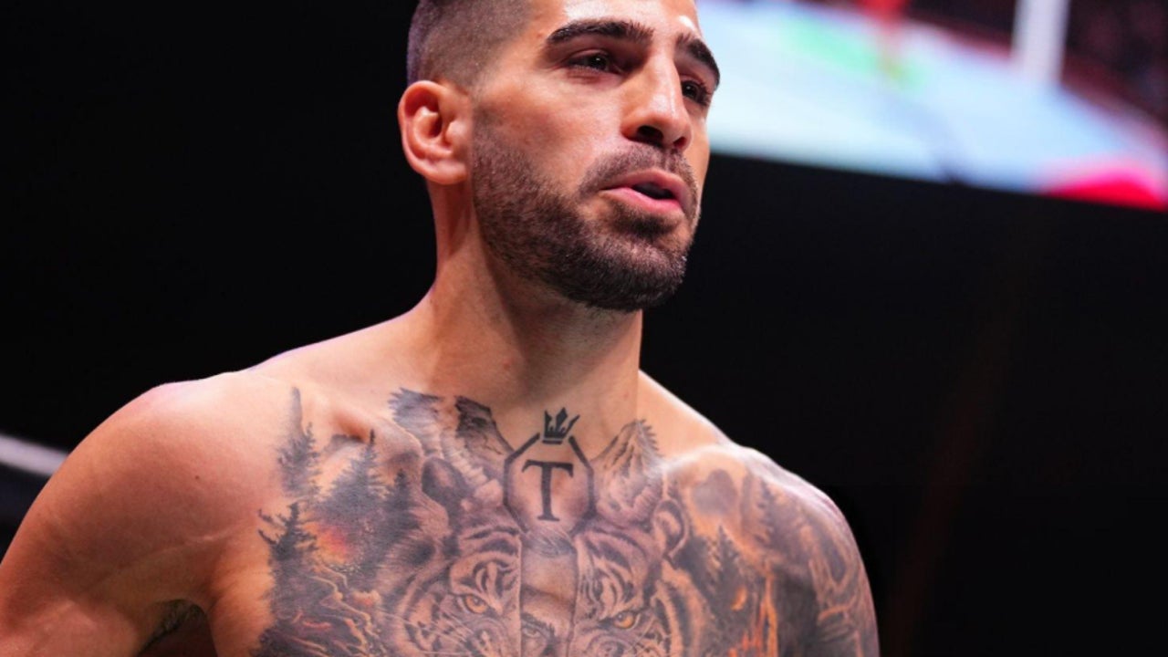 Ilia Topuria tattoos: tiger and wolf chest tattoo