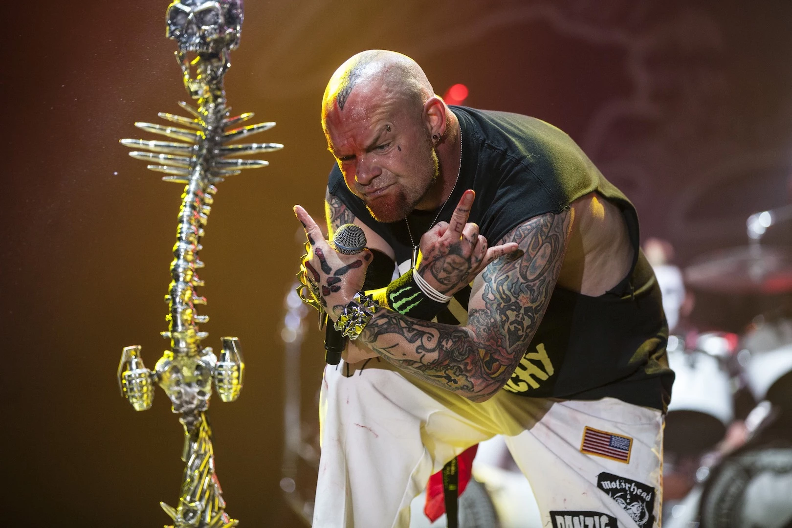 Ivan Moody snakeskin mohawk tattoo and tattooed arms