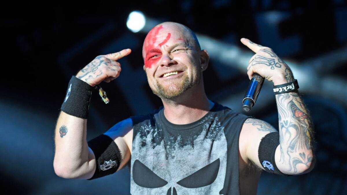 Ivan Moody Lucifer and Satan's eye tattoos