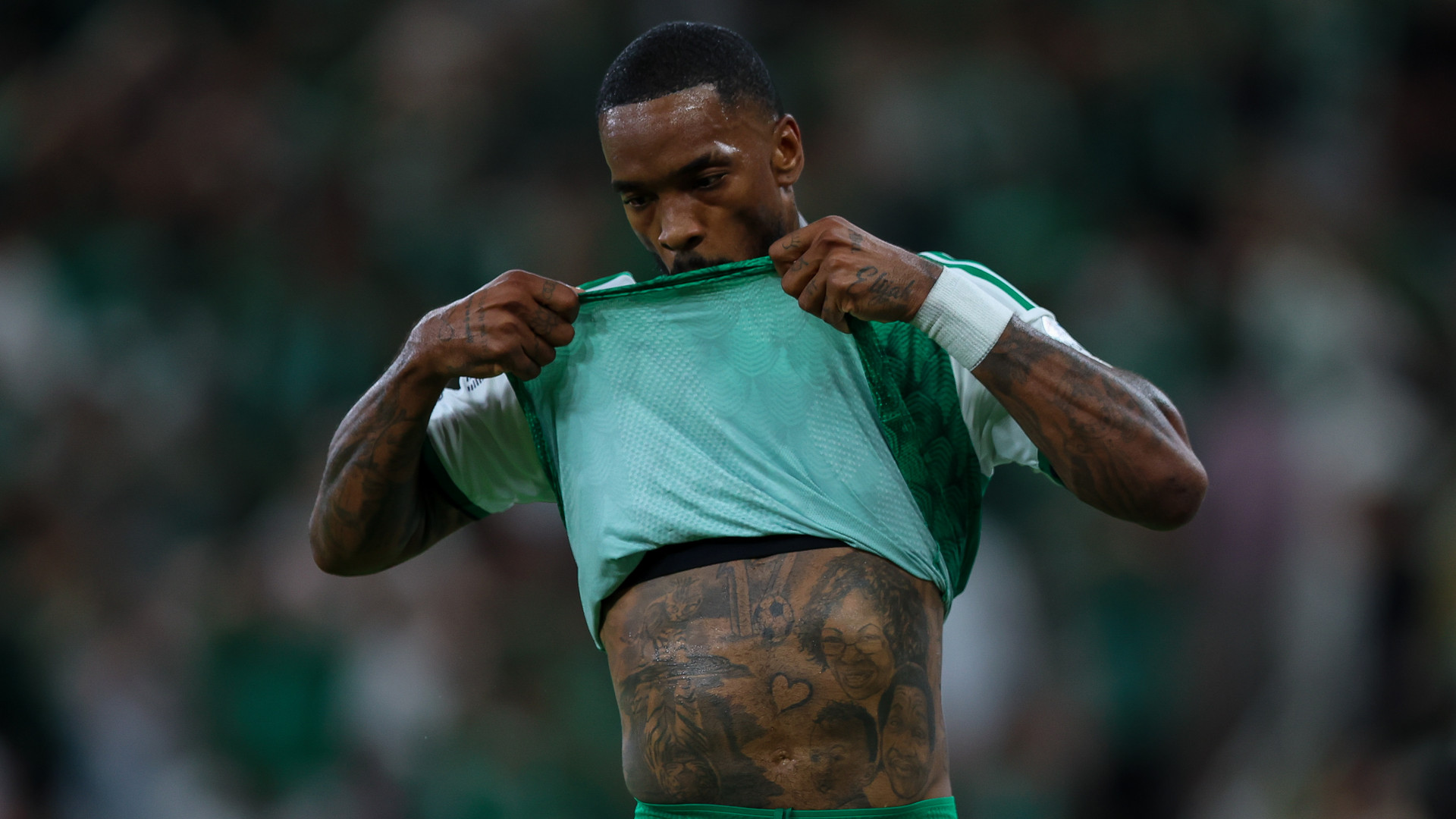 Ivan Toney tattoos: Separate later-career torso view showing the collection in an Al-Ahli match setting