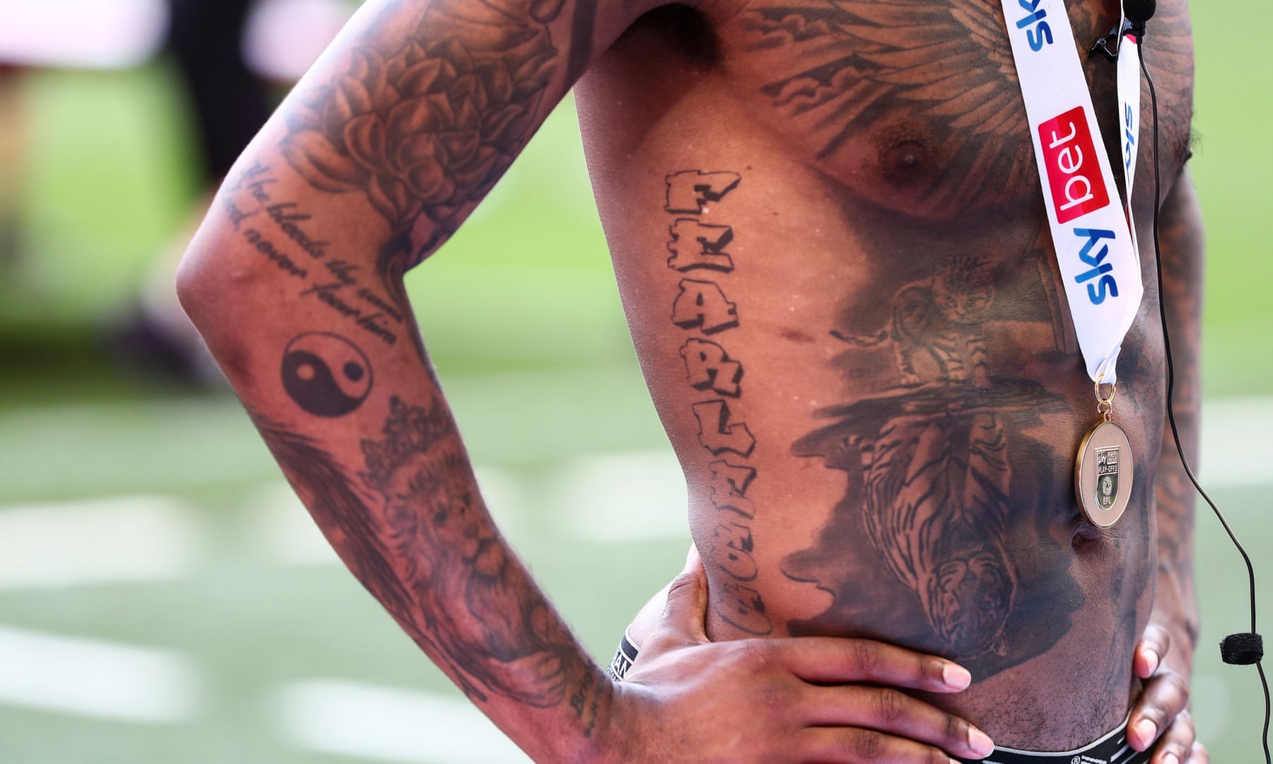 Ivan Toney tattoos: Torso photograph showing the tiger-and-kitten scene discussed in his Guardian interview