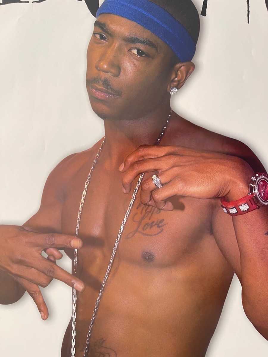 Ja Rule tattoos: high-resolution early-2000s portrait showing the chest lettering and arm ink in a separate view