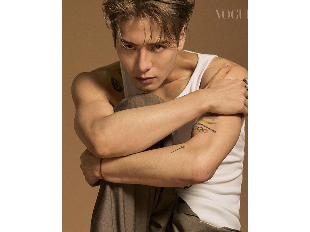Jackson Wang tattoos: Olympic rings and forearm symbols Jackson Wang tattoos: Jackson Wang Olympic rings and forearm symbols