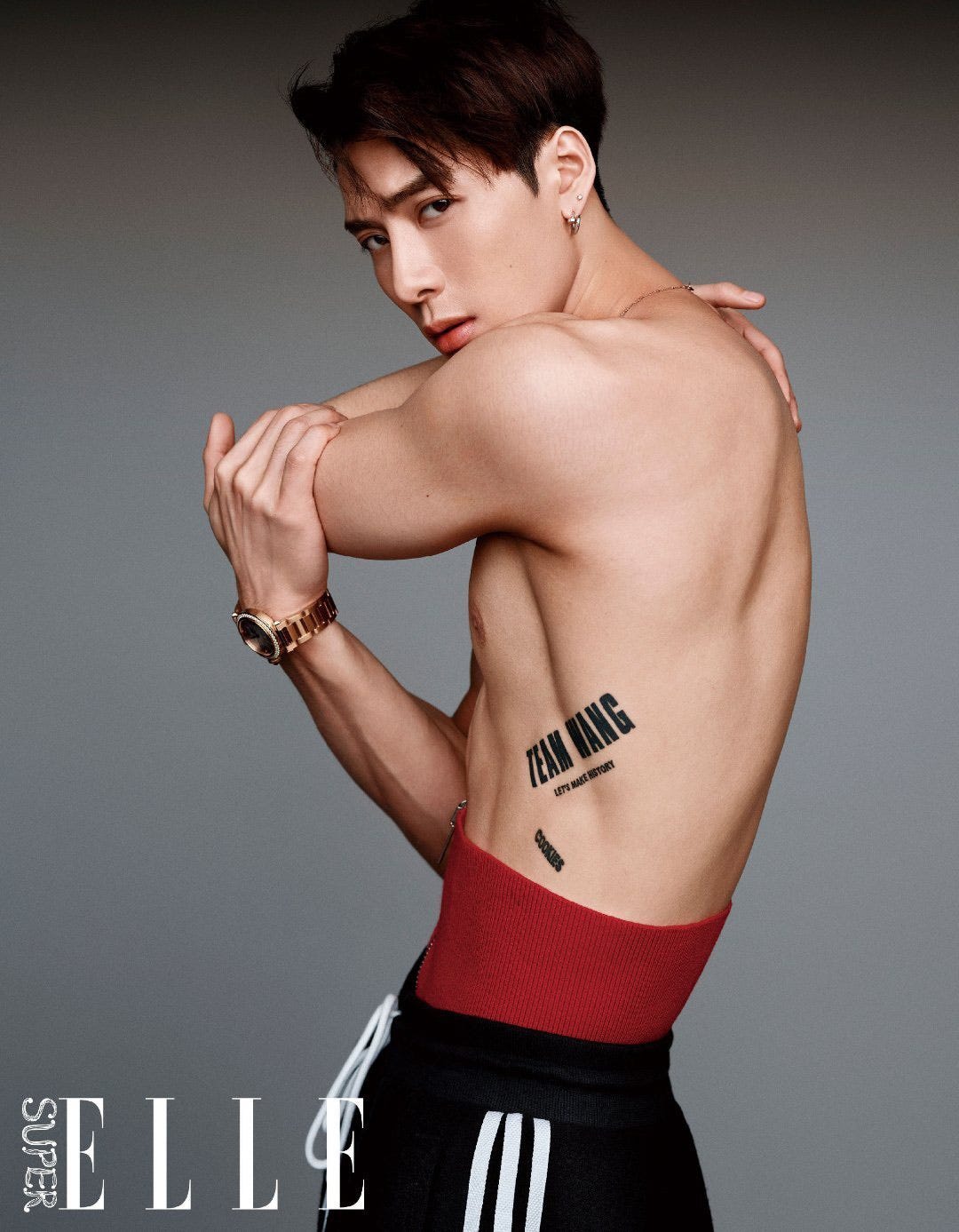 Jackson Wang tattoos: side view of the rib lettering Jackson Wang tattoos: Jackson Wang side view of rib lettering