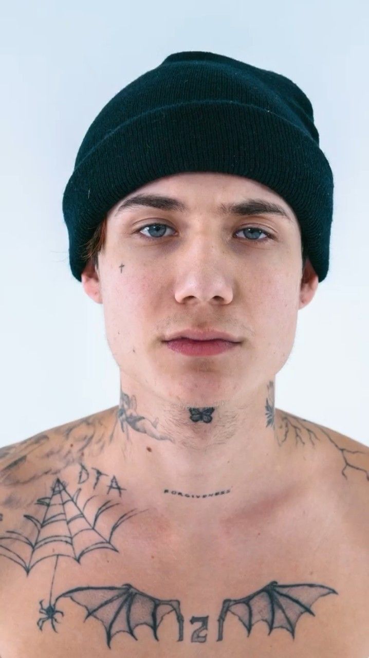 Jaden Hossler showing his forgiveness and chest tattoos