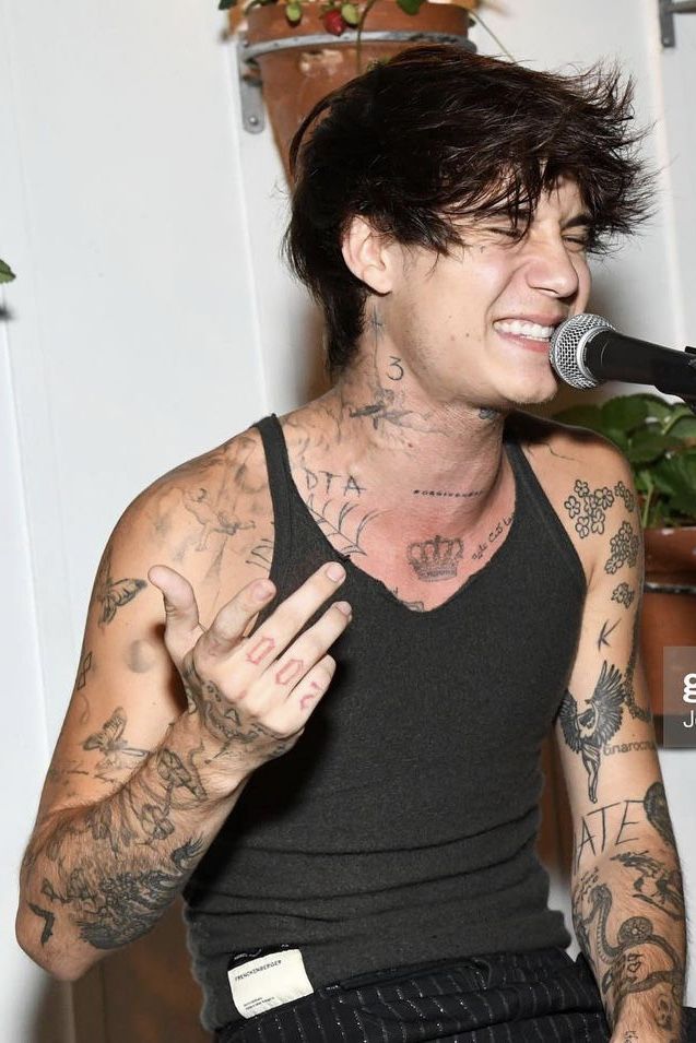 Jaden Hossler showing his live chest and sleeve tattoos