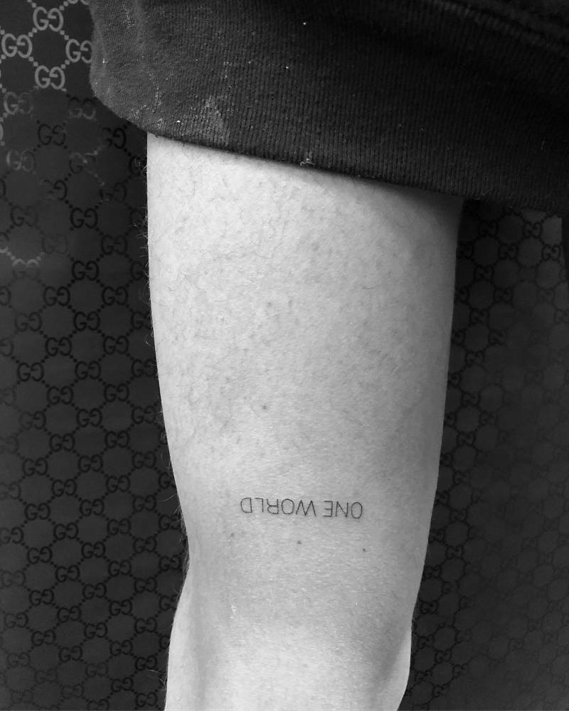 Jaden Smith tattoos: One World thigh lettering