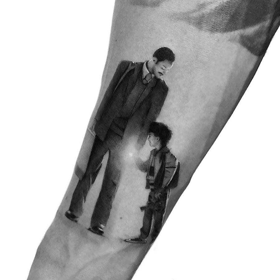 Jaden Smith tattoos: The Pursuit of Happyness inner forearm scene