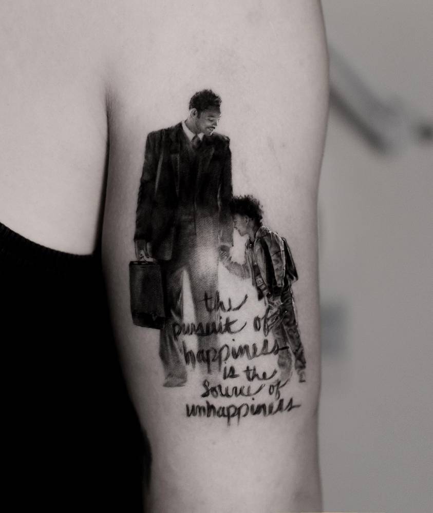 Jaden Smith tattoos: The Pursuit of Happyness micro-realistic tricep scene