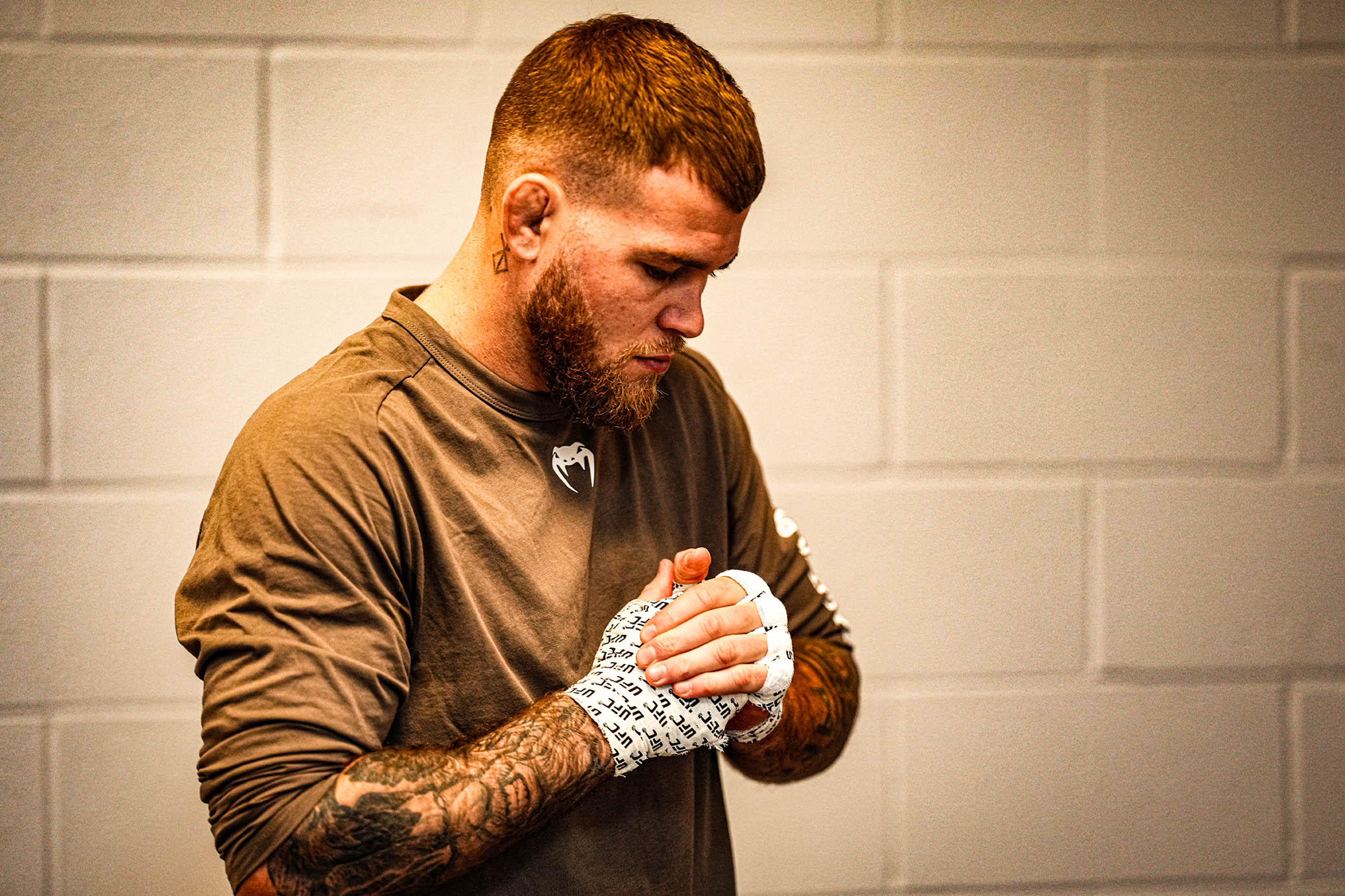 Jake Matthews tattoos: The Berserk tattoo behind his right ear